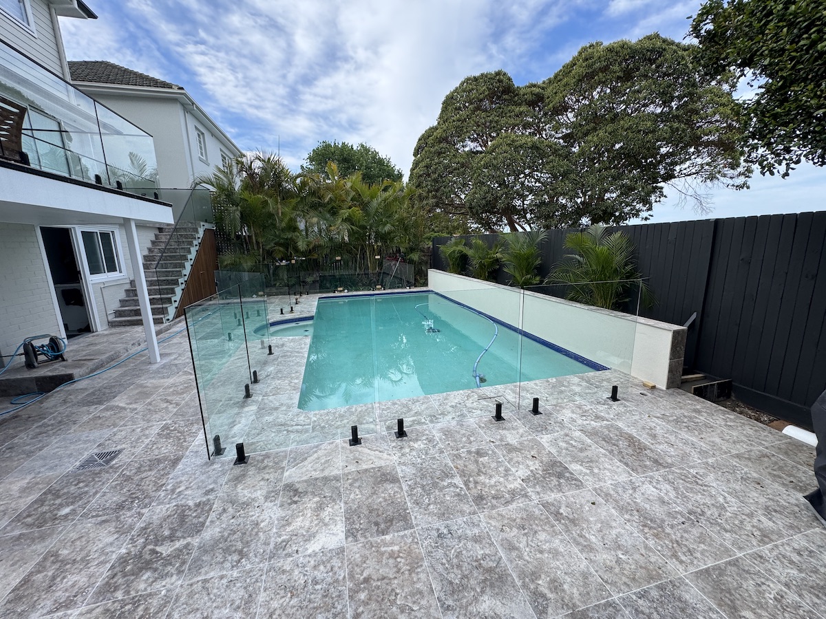 Bella Pools team resurfacing and retiling Mosman plunge pool